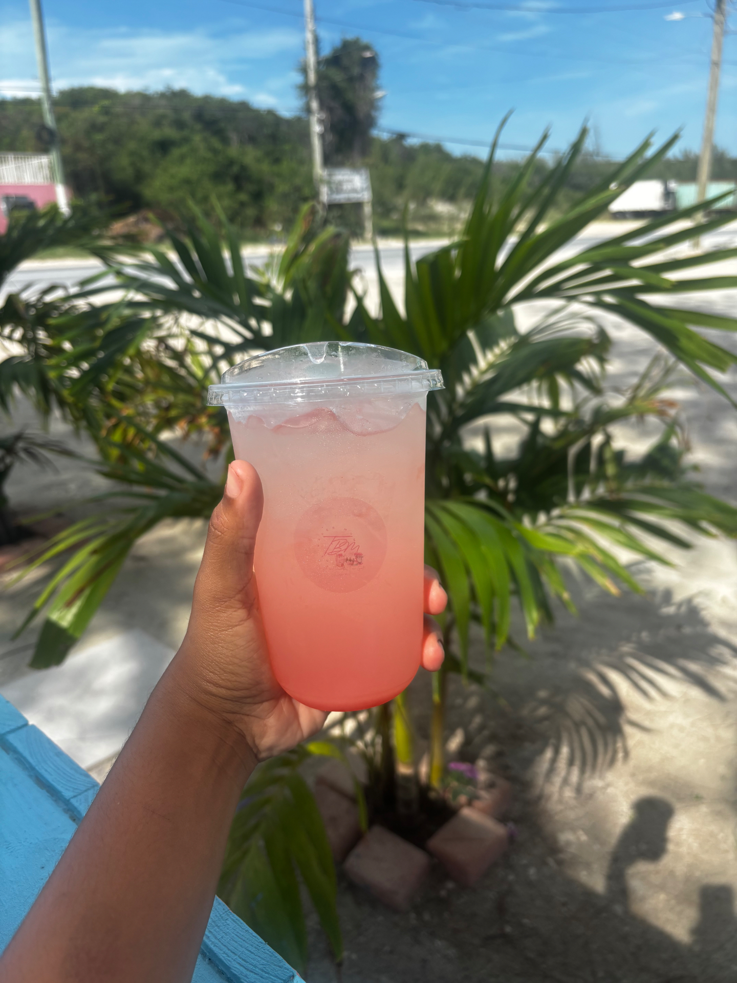 Pink iced refresher drink from The Baker Mom coffee stand